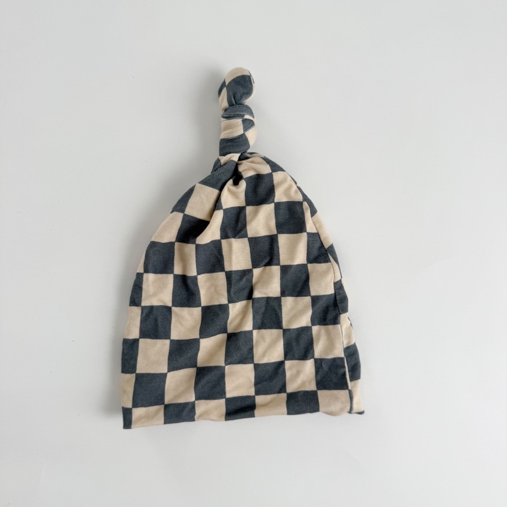 Lou Lou checker top knot hat